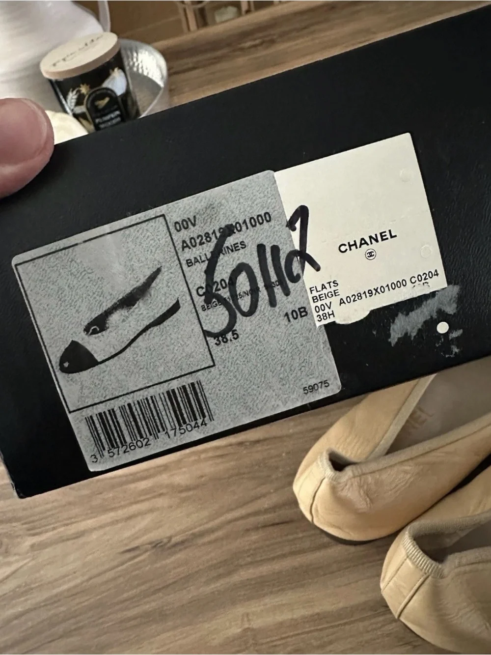 CHANEL Beige Leather Ballet Flats with Black Cap Toe